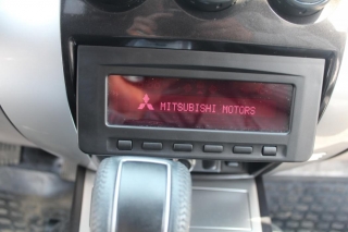 Переходная рамка Mitsubishi Pajero Sport 2009 перенос бортового компьютера вниз